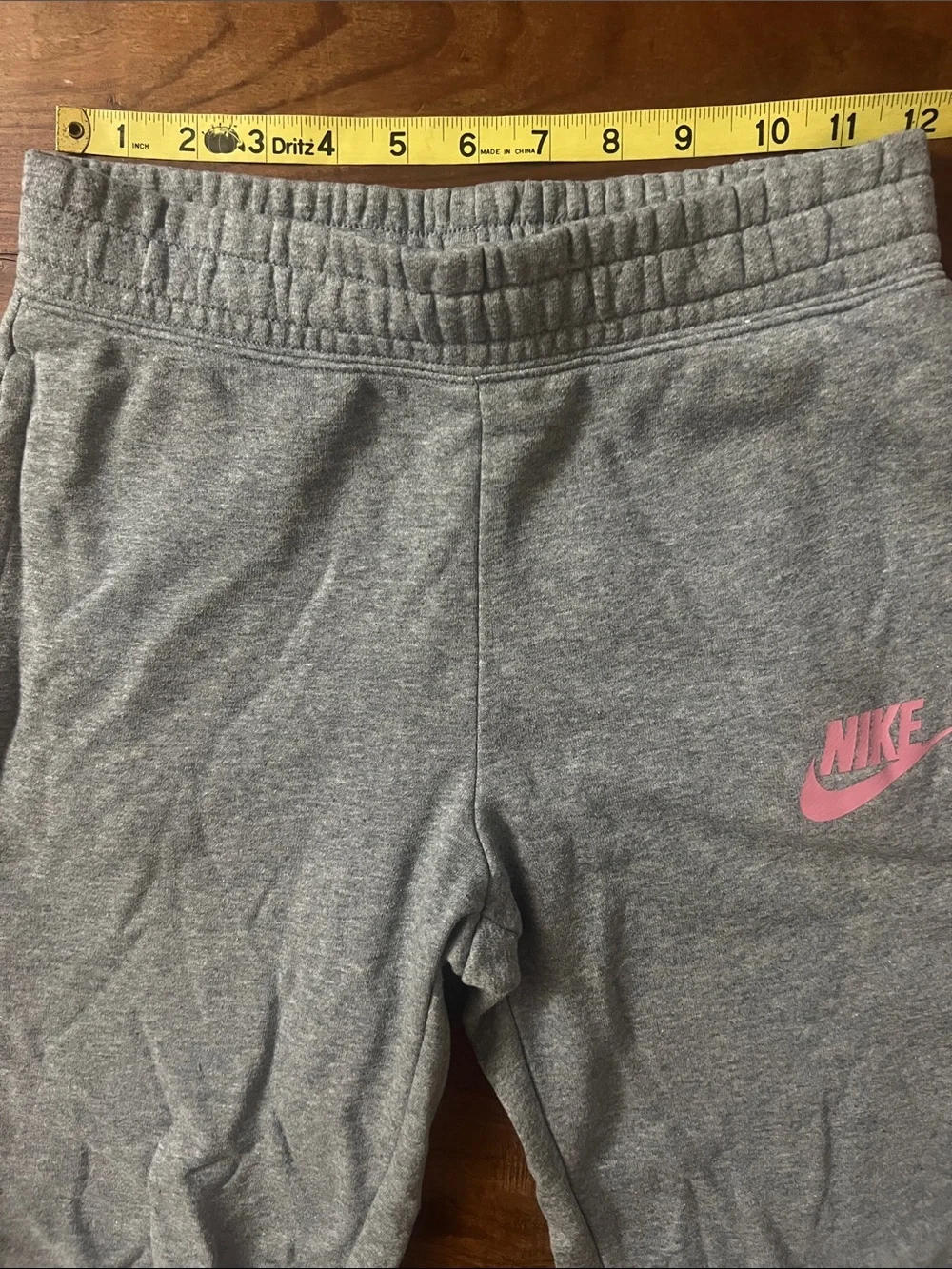 Nike Gray girl’s Sweatpants with Pink Swoosh
